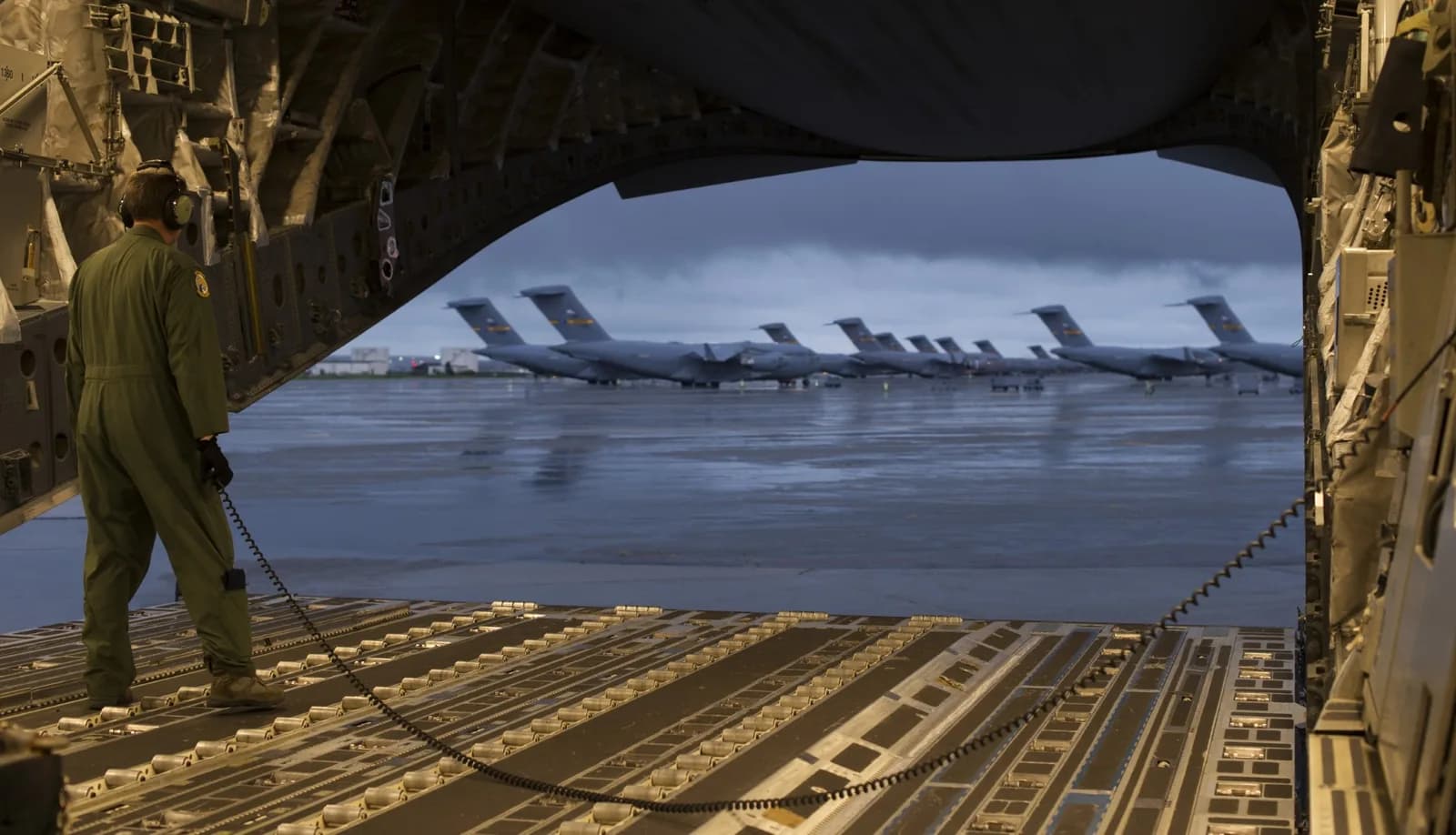 View from a C-17 cargo ramp across a flight line, U.S. Air Force photo